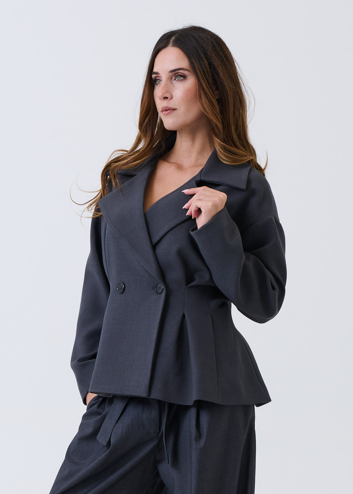 Ingrandisci