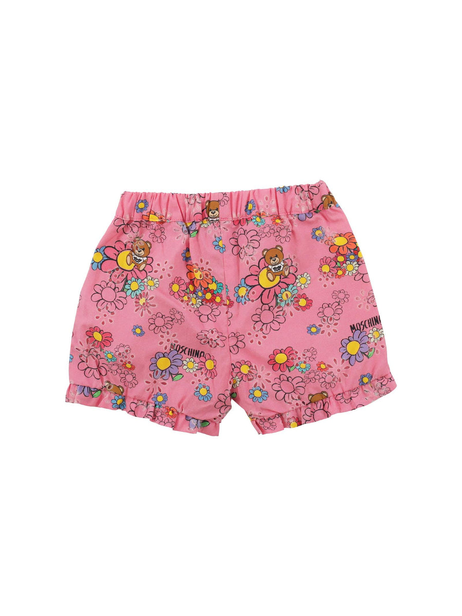 Shorts fucsia con stampa margherite MDQ008 84619 Moschino 
