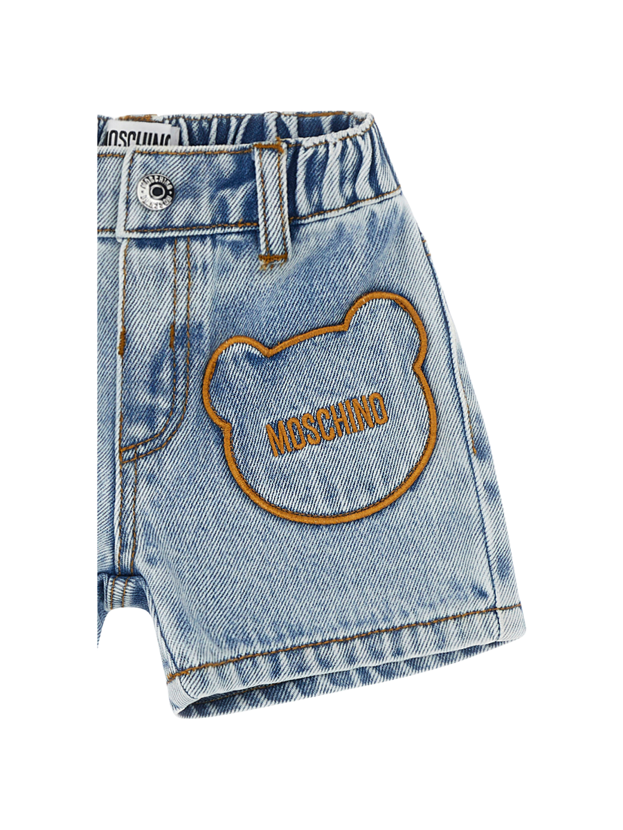 Shorts di jeans Moschino azzurro in denim con tasche a forma di orsetto MUQ017 40186 Moschino 