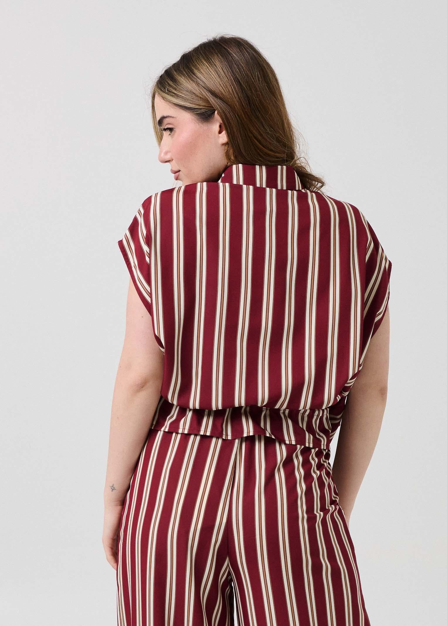 Ingrandisci