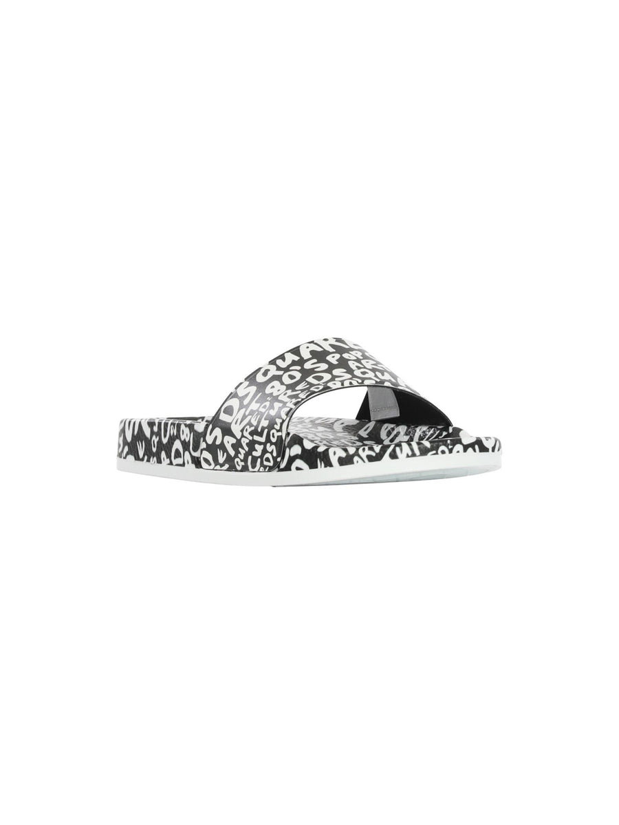 Ciabatte unisex nere con logo bianco all over DQ0612 H1532 Dsquared 