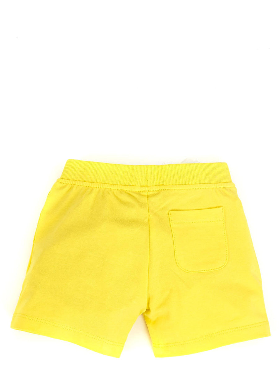 Shorts giallo modello tuta con logo frontale MUQ00JLBA18 50162 Moschino 