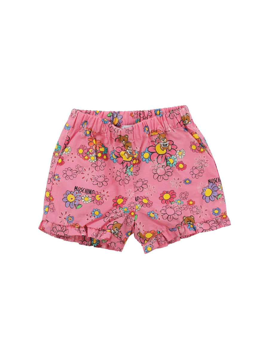 Shorts fucsia con stampa margherite MDQ008 84619 Moschino 