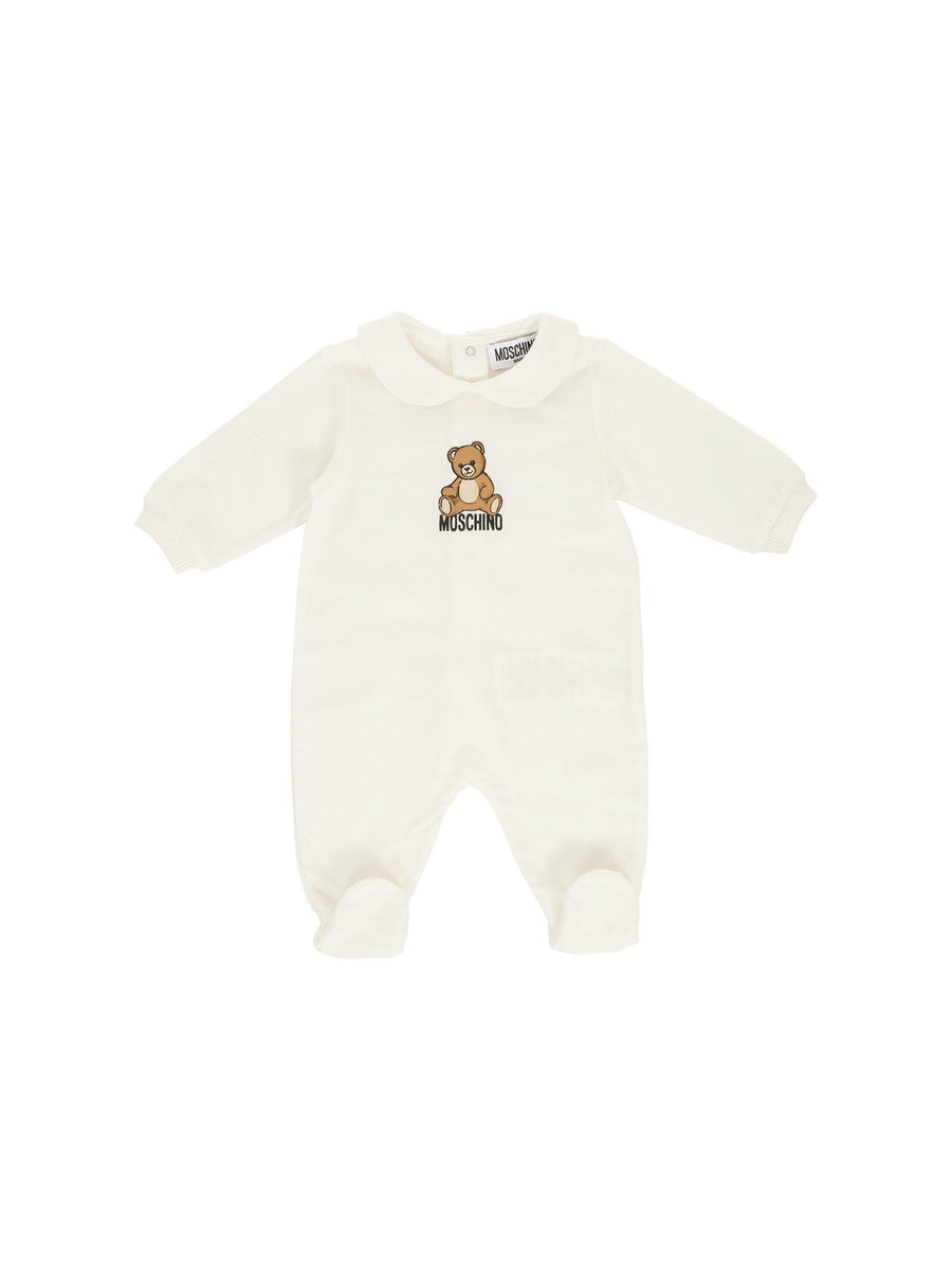 Tutina con piedini Moschino bianca con logo e teddy MUT04I 10063 Moschino 