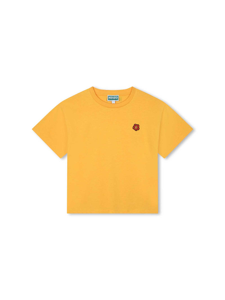 T-shirt arancio pastello con piccolo logo