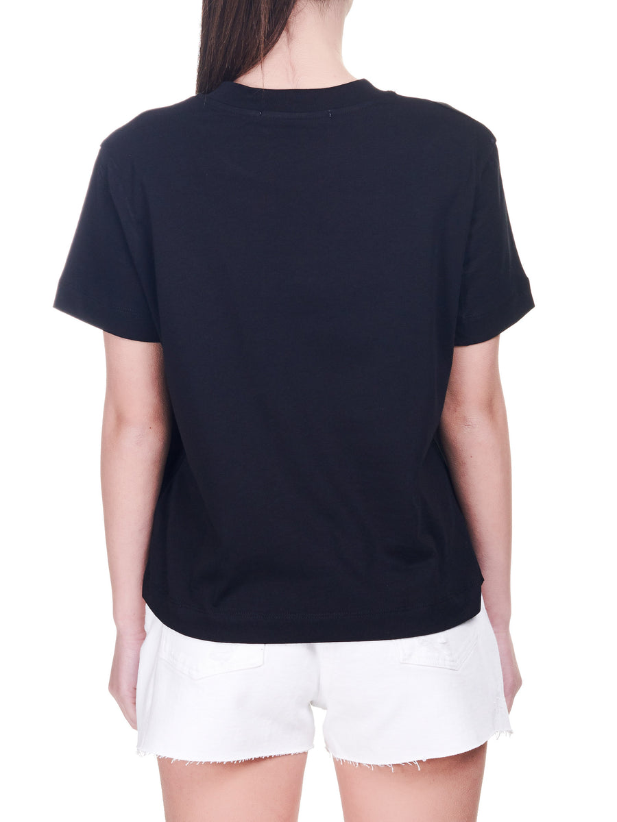 T-shirt nera con logo cangiante