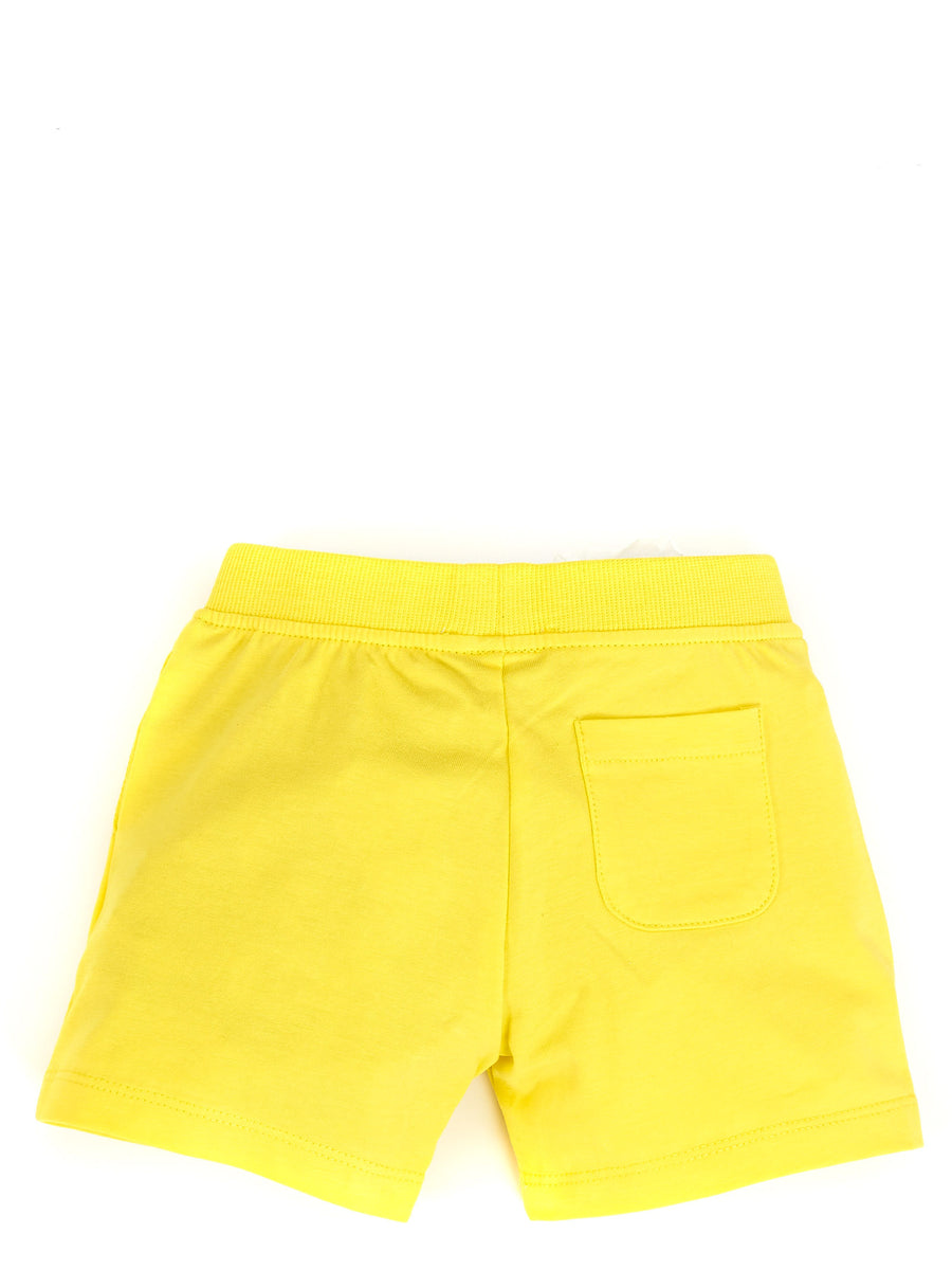 Shorts giallo modello tuta con logo frontale