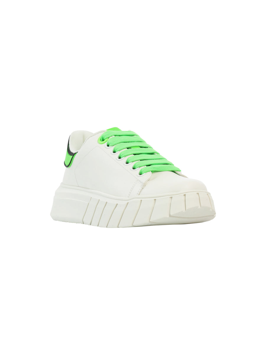 Sneakers addict bianca e verde fluo